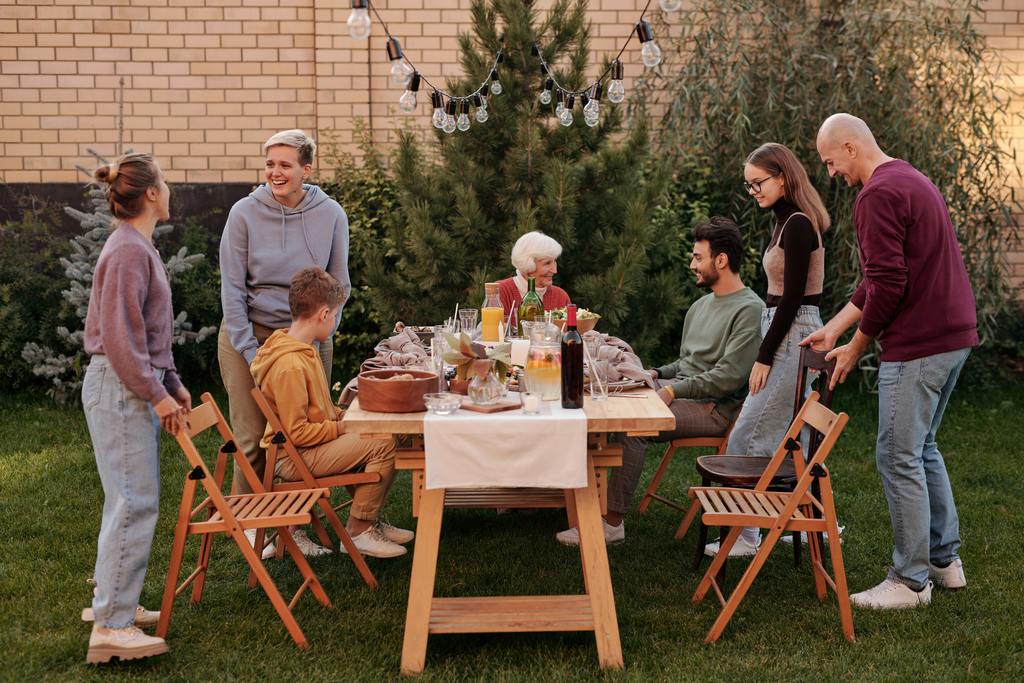 Family gathering in the backyard on outdoor table