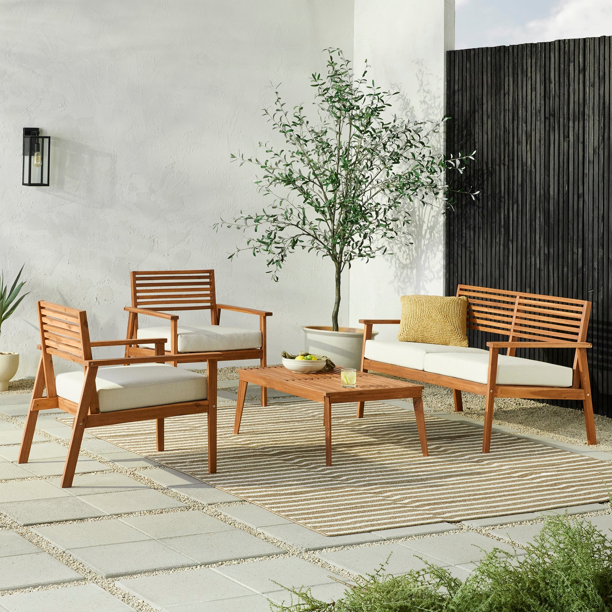 Walker Edison Zander 4-Piece Mid-Century Modern Acacia Outdoor Slat-Back Chat Set with Coffee Table